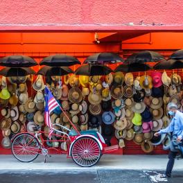 Walking past a wall of hats 
