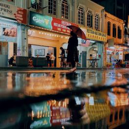 Woman walking after the rain