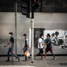 People walking outdoors with face masks during a pandemic